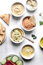 Load image into Gallery viewer, Whole chipotle peppers blended with creamy tahini, tender chickpeas, and our signature spice blend make this recipe rich and nourishing. Pair it with crunchy veggies, warm pita, and bowls.
